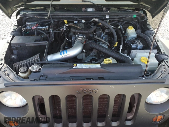 2008 Jeep Wrangler Unlimited X with VIN 1J4GB39108L608465, listed as a Copart auction lot 50949015 with 103,205 mi miles and Salvage Title. Bid and sale history available at DreamBid. Image 11.