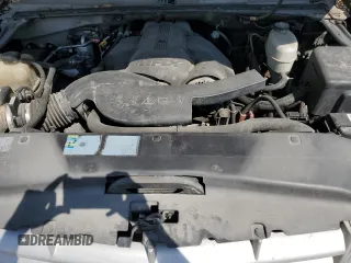 2006 Cadillac Escalade z VIN 1GYEK63N26R128359, wystawiony jako Copart lot #59198834 z przebiegiem 309 682 mil mil oraz Szkoda całkowita • Salvage title. Historia ofert i sprzedaży dostępna na DreamBid. Obrazek 11.