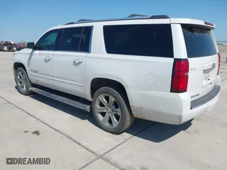 2020 Chevrolet Suburban Premier with VIN 1GNSCJKCXLR263570, listed as a IAAI auction lot 41980013 with 1 mi miles. Bid and sale history available at carsss.com. Image 3.