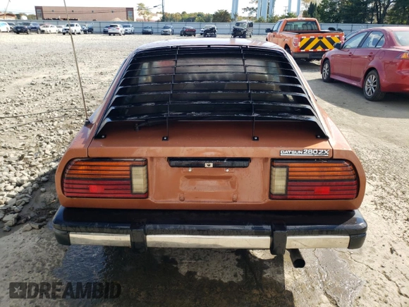 1981 Datsun 280ZX 2+2 z VIN JN1HZ06S6BX193317, wystawiony jako Copart lot #75494384 z przebiegiem 78 678 mil mil oraz Szkody całkowita. Historia ofert i sprzedaży dostępna na DreamBid. Obrazek 6.