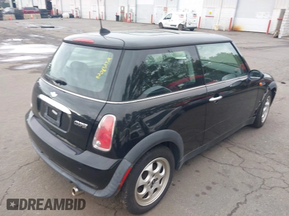 2005 MINI Hardtop with VIN WMWRC33535TJ70850, listed as a IAAI auction lot 42219720 with 66,398 mi miles and . Bid and sale history available at DreamBid. Image 4.