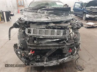 2018 Jeep Compass Trailhawk with VIN 3C4NJDDB2JT211775, listed as a IAAI auction lot 41610112 with 99,238 mi miles and . Bid and sale history available at DreamBid. Image 6.