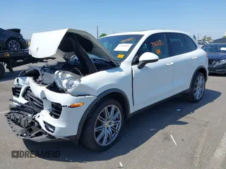 2016 Porsche Cayenne with VIN WP1AA2A22GKA37187, listed as a IAAI auction lot 42406852 with 70,686 mi miles and . Bid and sale history available at DreamBid. Image 2.