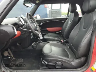 2012 MINI Convertible with VIN WMWZN3C58CT134224, listed as a Copart auction lot 57610015 with 141,394 mi miles and Salvage title. Bid and sale history available at DreamBid. Image 7.