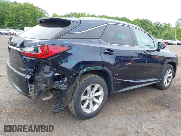 2016 Lexus RX 350 with VIN 2T2BZMCA6GC010568, listed as a IAAI auction lot 42352197 with 72,146 mi miles and . Bid and sale history available at DreamBid. Image 6.