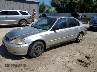 2000 Honda Civic VP z VIN 2HGEJ6612YH596310, wystawiony jako Copart lot #53707725 z przebiegiem 138 855 mil mil oraz Szkoda całkowita • Salvage title. Historia ofert i sprzedaży dostępna na DreamBid. Obrazek 1.
