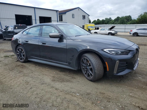 2023 BMW i4 M50 with VIN WBY33AW00PFP17764, listed as a Copart auction lot 64369804 with 18,065 mi miles and Salvage Title. Bid and sale history available at carsss.com. Image 4.