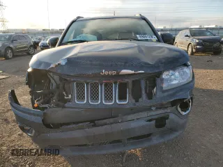 2014 Jeep Compass High Altitude with VIN 1C4NJCEAXED680799, listed as a Copart auction lot 89081285 with 63,447 mi miles and Salvage Title. Bid and sale history available at carsss.com. Image 5.