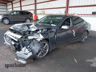 2015 Infiniti Q50 Premium z VIN JN1BV7AR3FM422042, wystawiony jako IAAI lot #42258784 z przebiegiem 72 030 mil mil oraz . Historia ofert i sprzedaży dostępna na DreamBid. Obrazek 17.