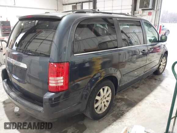 2008 Chrysler Town & Country Touring with VIN 2A8HR54P38R684386, listed as a IAAI auction lot 41463061 with 140,392 mi miles. Bid and sale history available at carsss.com. Image 4.