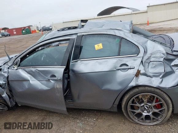 2014 Mitsubishi Lancer Evolution MR with VIN JA32W5FV7EU008165, listed as a IAAI auction lot 41553978 with 49,284 mi miles. Bid and sale history available at carsss.com. Image 14.
