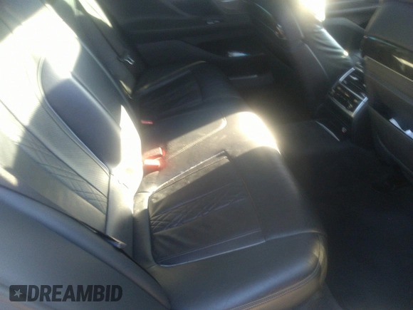 2018 BMW 7 Series 740i with VIN WBA7E2C57JG742257, listed as a IAAI auction lot 41353435 with 77,125 mi miles. Bid and sale history available at carsss.com. Image 8.