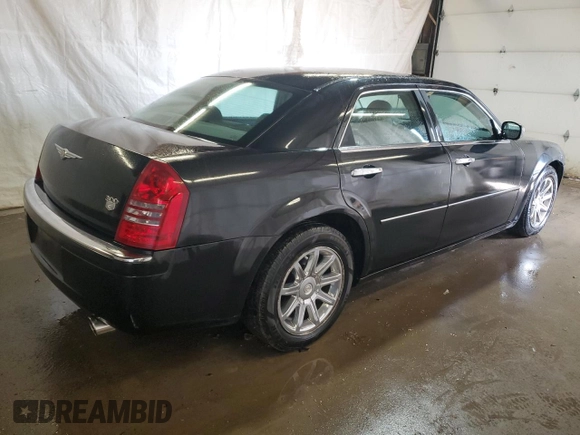 2005 Chrysler 300 with VIN 2C3JA63HX5H501958, listed as a Copart auction lot 52676825 with 119,395 mi miles and Salvage Title. Bid and sale history available at carsss.com. Image 3.