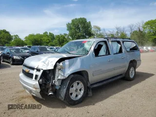 2011 Chevrolet Suburban LT with VIN 1GNSKJE31BR215677, listed as a Copart auction lot 58351595 with Not provided miles and Salvage title. Bid and sale history available at DreamBid. Image 1.