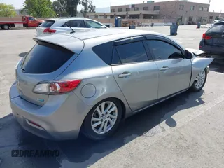 2012 Mazda Mazda3 i Touring with VIN JM1BL1L89C1558242, listed as a IAAI auction lot 42057513 with 112,094 mi miles. Bid and sale history available at carsss.com. Image 4.