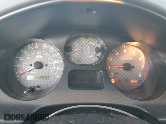 1999 Toyota RAV4 with VIN JT3GP10VXX7053225, listed as a Copart auction lot 87920975 with 228,943 mi miles and Salvage Title. Bid and sale history available at DreamBid. Image 9.