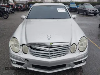 2003 Mercedes-Benz E-Class 5.5L AMG with VIN WDBUF76J93A351317, listed as a IAAI auction lot 41573446 with 144,119 mi miles. Bid and sale history available at carsss.com. Image 12.