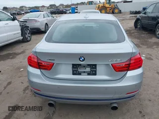 2015 BMW 4 Series 435i xDrive z VIN WBA4B3C58FD670236, wystawiony jako IAAI lot #41364258 z przebiegiem 126 362 mil mil oraz . Historia ofert i sprzedaży dostępna na DreamBid. Obrazek 16.