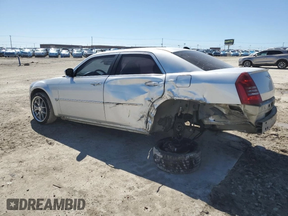 2006 Chrysler 300 C SRT8 with VIN 2C3KA73W76H101950, listed as a Copart auction lot 48501125 with 144,696 mi miles and Salvage Title. Bid and sale history available at carsss.com. Image 2.