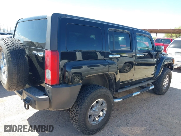 2007 Hummer H3 SUV with VIN 5GTDN13E578153252, listed as a IAAI auction lot 42003767 with 130,810 mi miles. Bid and sale history available at carsss.com. Image 4.