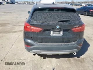 2018 BMW X1 sDrive28i with VIN WBXHU7C31J5H39068, listed as a Copart auction lot 49018985 with 100,611 mi miles and Salvage Title. Bid and sale history available at carsss.com. Image 6.