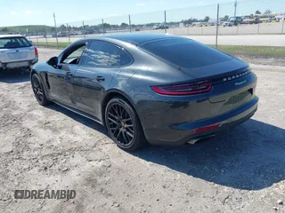 2020 Porsche Panamera 4 E-Hybrid z VIN WP0AE2A79LL132755, wystawiony jako IAAI lot #42040868 z przebiegiem 34 567 mil mil oraz . Historia ofert i sprzedaży dostępna na DreamBid. Obrazek 3.