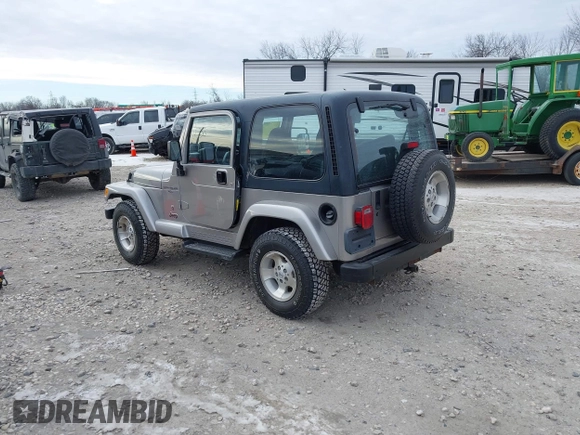 2001 Jeep Wrangler Sport z VIN 1J4FA49S31P349269, wystawiony jako IAAI lot #41427014 z przebiegiem 112 421 mil mil oraz . Historia ofert i sprzedaży dostępna na DreamBid. Obrazek 3.
