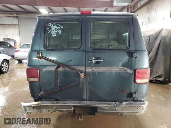 1995 Chevrolet Chevy Van z VIN 1GBEG25K2SF243949, wystawiony jako Copart lot #50422305 z przebiegiem 193 169 mil mil oraz Szkody całkowita. Historia ofert i sprzedaży dostępna na DreamBid. Obrazek 6.