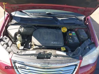 2014 Chrysler Town & Country Touring with VIN 2C4RC1BG9ER326259, listed as a IAAI auction lot 42160484 with 151,896 mi miles and . Bid and sale history available at DreamBid. Image 10.