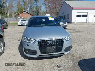 2015 Audi Q3 2.0T Premium Plus with VIN WA1EFCFSXFR010015, listed as a IAAI auction lot 42099410 with 142,117 mi miles. Bid and sale history available at carsss.com. Image 12.