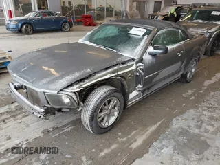 2007 Ford Mustang Deluxe with VIN 1ZVFT84N075276744, listed as a IAAI auction lot 41559826 with 145,129 mi miles and . Bid and sale history available at carsss.com. Image 2.