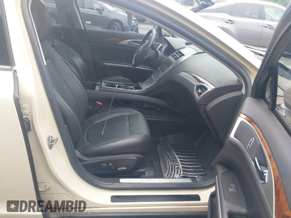 2014 Lincoln MKZ Hybrid with VIN 3LN6L2LU8ER813195, listed as a IAAI auction lot 42578644 with 153,893 mi miles and . Bid and sale history available at DreamBid. Image 5.