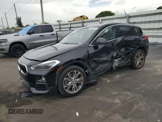 2018 BMW X2 sDrive28i with VIN WBXYJ3C34JEJ91176, listed as a Copart auction lot 63418365 with 62,586 mi miles and Salvage title. Bid and sale history available at DreamBid. Image 1.