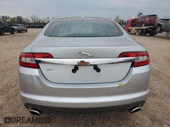 2011 Jaguar XF with VIN SAJWA0FB6BLS12162, listed as a Copart auction lot 86744904 with 135,943 mi miles and Salvage Title. Bid and sale history available at carsss.com. Image 6.