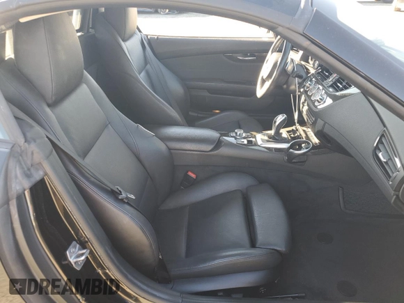 2016 BMW Z4 sDrive28i with VIN WBALL5C51G5A20067, listed as a Copart auction lot 43067105 with 37,409 mi miles and Salvage Title. Bid and sale history available at carsss.com. Image 10.