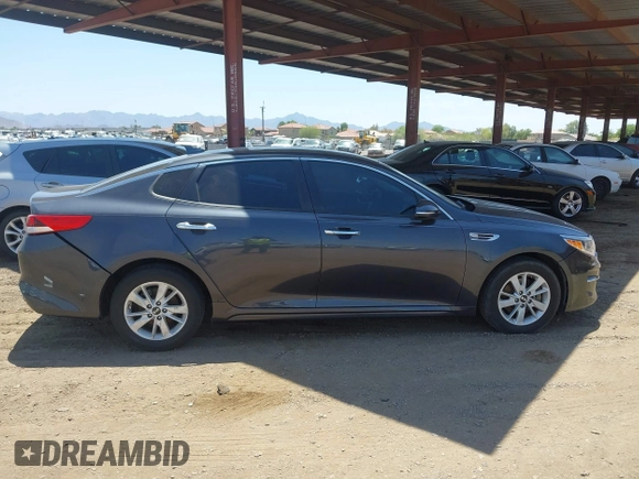 2017 Kia Optima LX with VIN KNAGT4L31H5149628, listed as a IAAI auction lot 42630216 with 102,329 mi miles and . Bid and sale history available at DreamBid. Image 13.