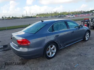 2013 Volkswagen Passat SE w/Sunroof & Nav with VIN 1VWBP7A35DC038217, listed as a IAAI auction lot 41944193 with 102,767 mi miles. Bid and sale history available at carsss.com. Image 4.