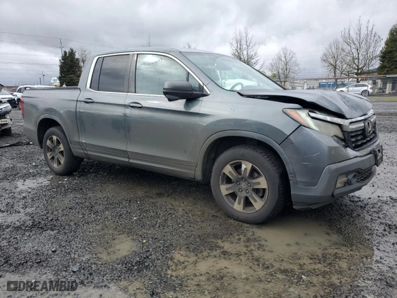 2017 Honda Ridgeline RTL-T with VIN 5FPYK3F69HB025784, listed as a Copart auction lot 48189915 with 164,176 mi miles and Salvage Title. Bid and sale history available at carsss.com. Image 4.