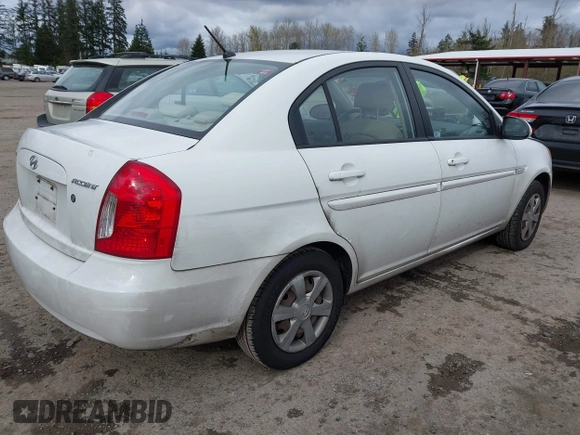 2007 Hyundai Accent GLS with VIN KMHCN46C67U097159, listed as a IAAI auction lot 41913373 with 103,303 mi miles. Bid and sale history available at carsss.com. Image 4.