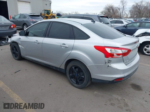 2013 Ford Focus SE with VIN 1FADP3F20DL361469, listed as a IAAI auction lot 41457037 with 127,852 mi miles. Bid and sale history available at carsss.com. Image 3.