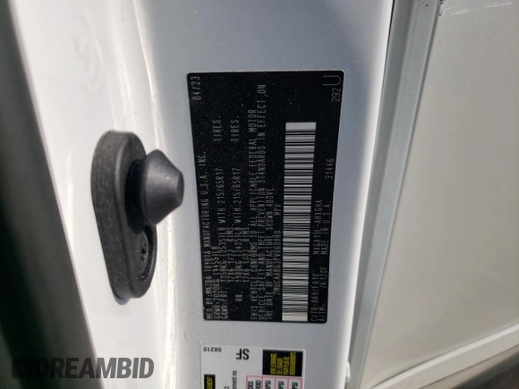 2023 Toyota Corolla Cross LE with VIN 7MUCAABG3PV060880, listed as a Copart auction lot 59664915 with 18,246 mi miles and Salvage title. Bid and sale history available at DreamBid. Image 13.