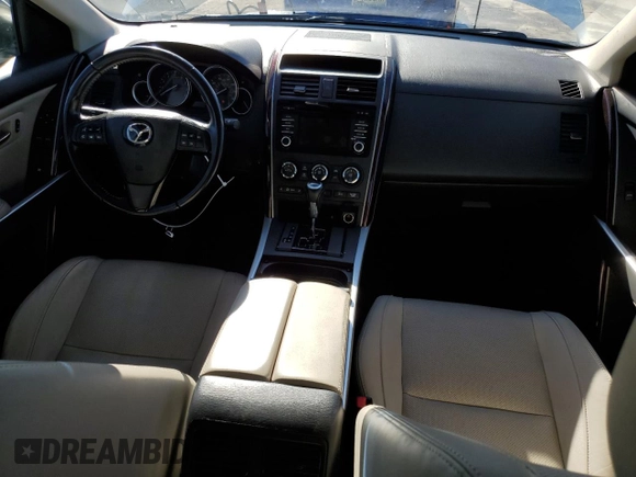 2015 Mazda CX-9 Grand Touring с VIN JM3TB2DA1F0462203, выставлен на аукционе Copart как лот 37073714 с пробегом 101 293 миль миль и Списание • Salvage title. История ставок и продаж доступна на DreamBid. Изображение 8.