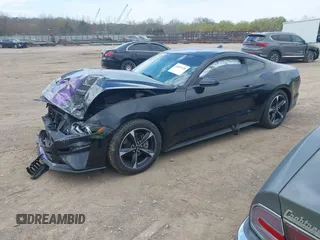 2022 Ford Mustang EcoBoost with VIN 1FA6P8TH4N5136069, listed as a IAAI auction lot 41897170 with 42,217 mi miles and . Bid and sale history available at DreamBid. Image 2.