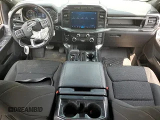 2023 Ford F-150 XL with VIN 1FTEW1EP7PFB66555, listed as a Copart auction lot 59384665 with 28,495 mi miles and Salvage title. Bid and sale history available at DreamBid. Image 8.