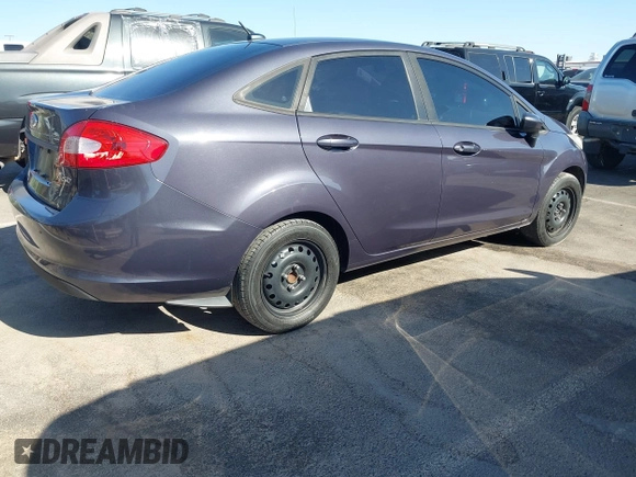 2012 Ford Fiesta S with VIN 3FADP4AJ4CM187553, listed as a IAAI auction lot 41965362 with 136,021 mi miles. Bid and sale history available at carsss.com. Image 4.