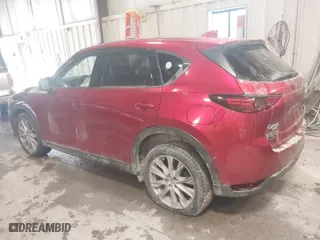 2021 Mazda CX-5 Grand Touring with VIN JM3KFBDMXM1430321, listed as a IAAI auction lot 41622134 with 44,955 mi miles. Bid and sale history available at carsss.com. Image 3.
