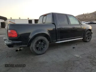2002 Ford F-150 Harley Davidson with VIN 1FTRW07332KE10689, listed as a Copart auction lot 88341885 with 0 mi miles and Salvage Title. Bid and sale history available at carsss.com. Image 3.