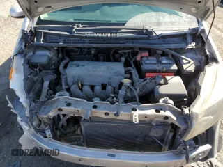2012 Toyota Yaris L z VIN JTDJTUD36CD501205, wystawiony jako Copart lot #49529145 z przebiegiem 307 992 mil mil oraz Szkoda całkowita • Salvage title. Historia ofert i sprzedaży dostępna na DreamBid. Obrazek 11.