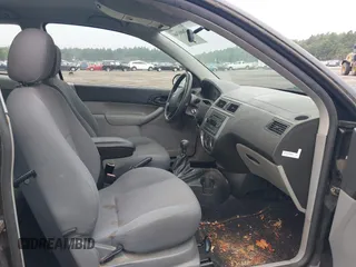 2005 Ford Focus S with VIN 3FAFP31N65R107956, listed as a IAAI auction lot 42686748 with 31,935 mi miles and . Bid and sale history available at DreamBid. Image 5.