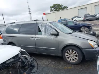 2010 Kia Sedona EX with VIN KNDMH4C33A6342127, listed as a IAAI auction lot 41570657 with 249,395 mi miles. Bid and sale history available at carsss.com. Image 13.